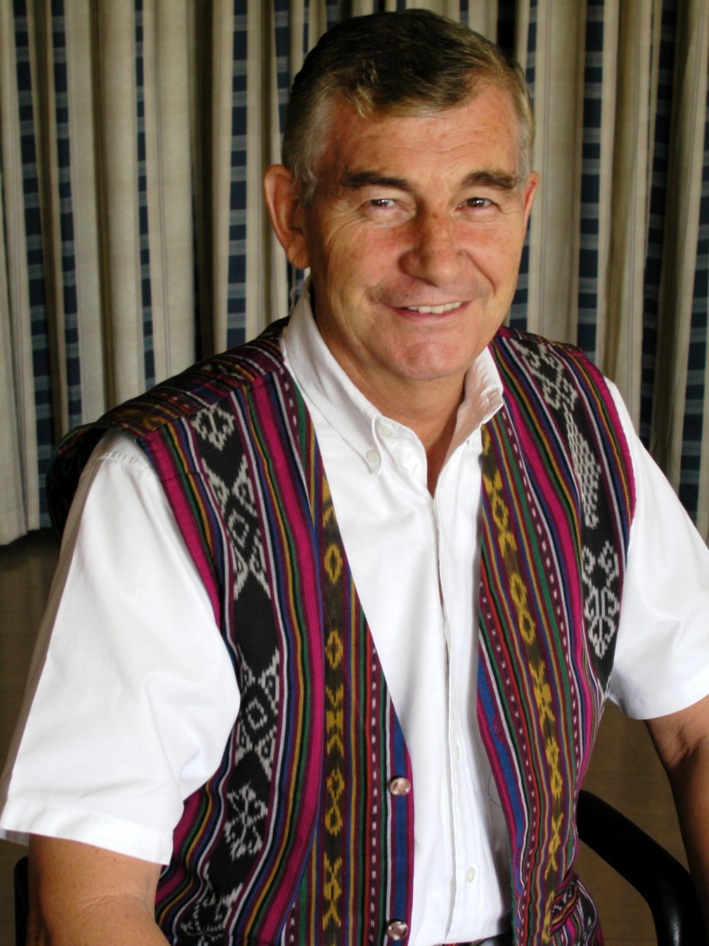 Shay Cullen smiling at camera