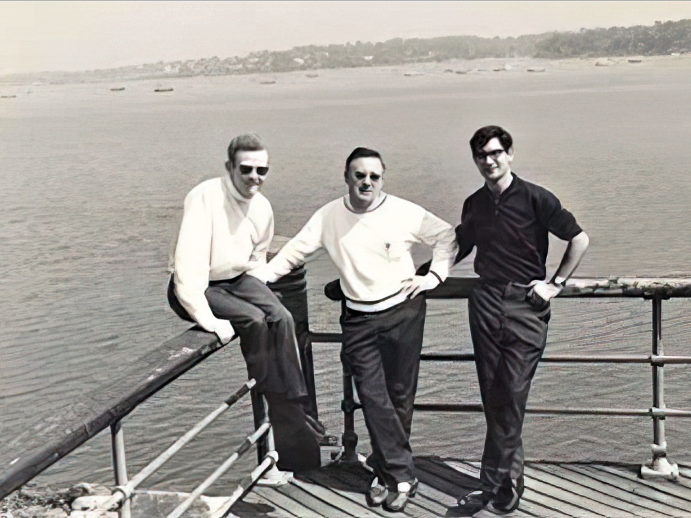 three men on boat to Philippines