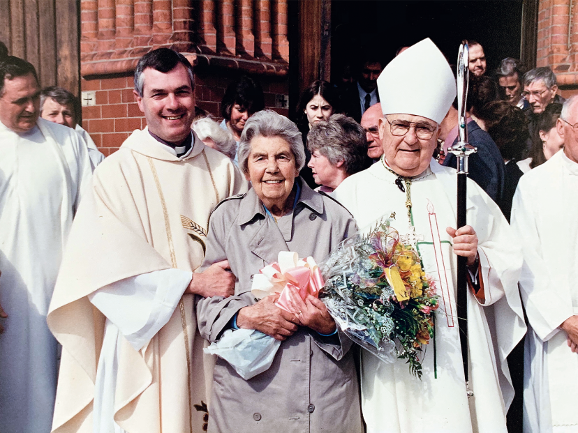Fr. John boles with Bishop John Boles with his mother between them