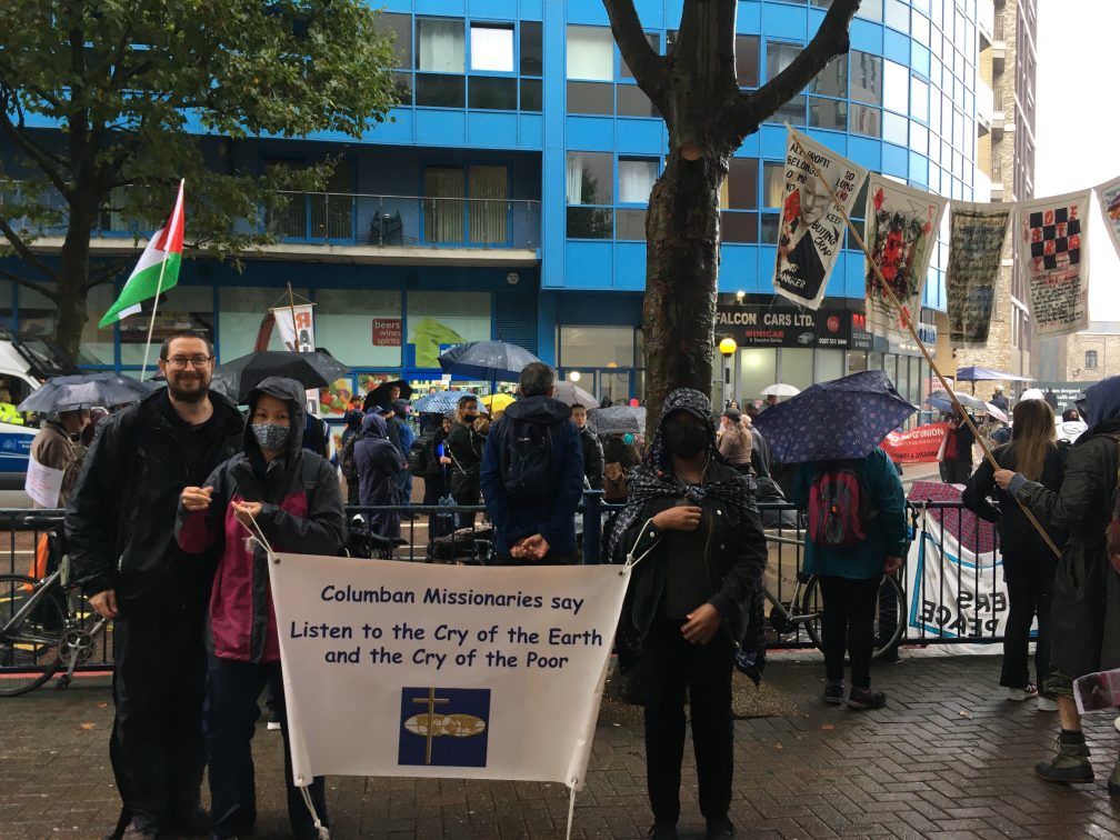 group of people with banners