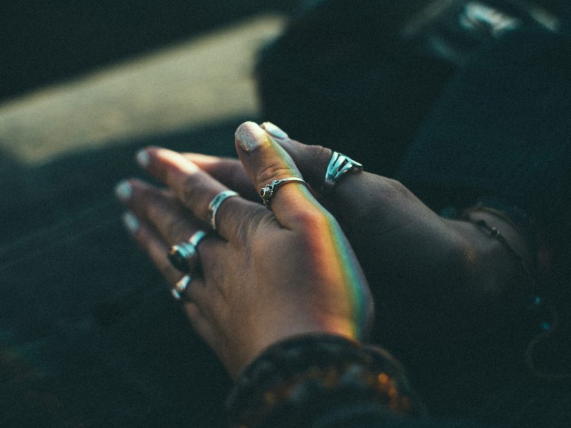 female hands joined in prayer