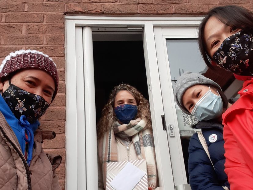 smiling faces outside sanctuary doors