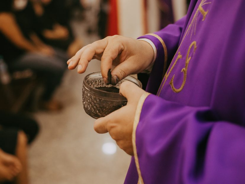 priest with ashes for lent