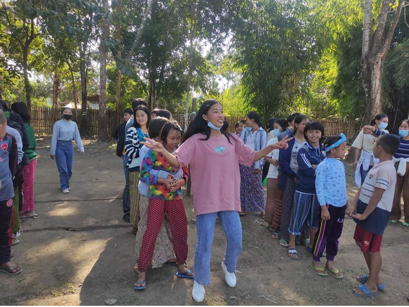 students teach dances to orphans