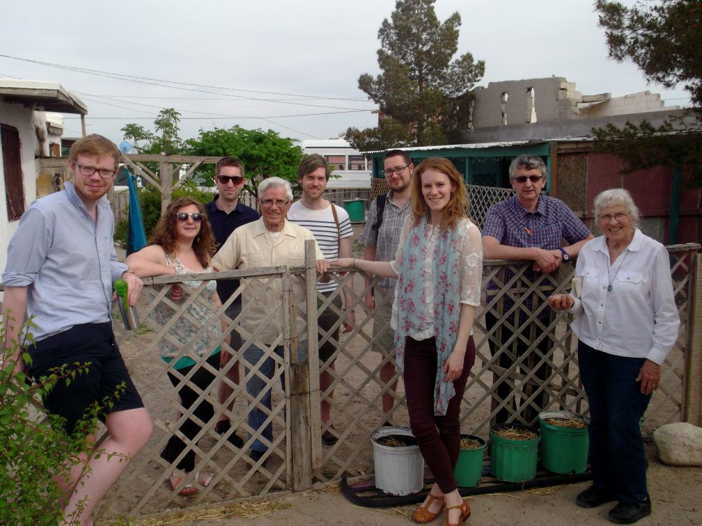 group in front of gates