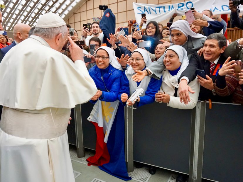 pope Francis greets crowds