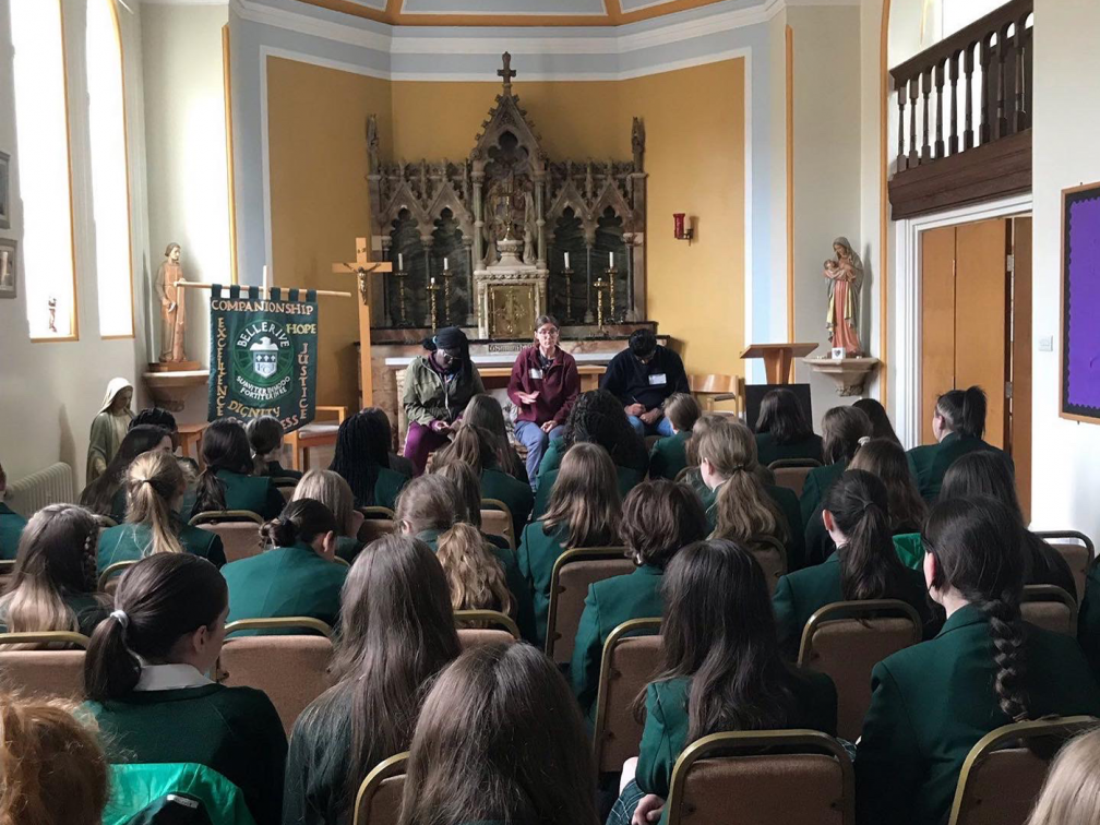 backs of children face asylum seekers telling their stories