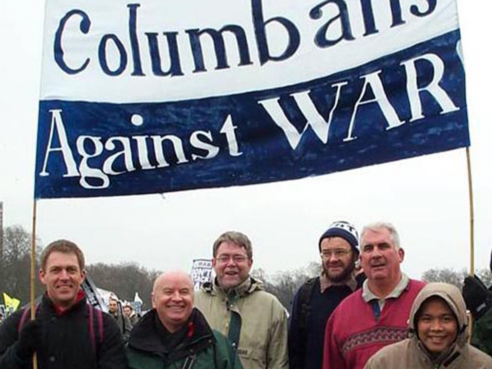 protest with Columban banner