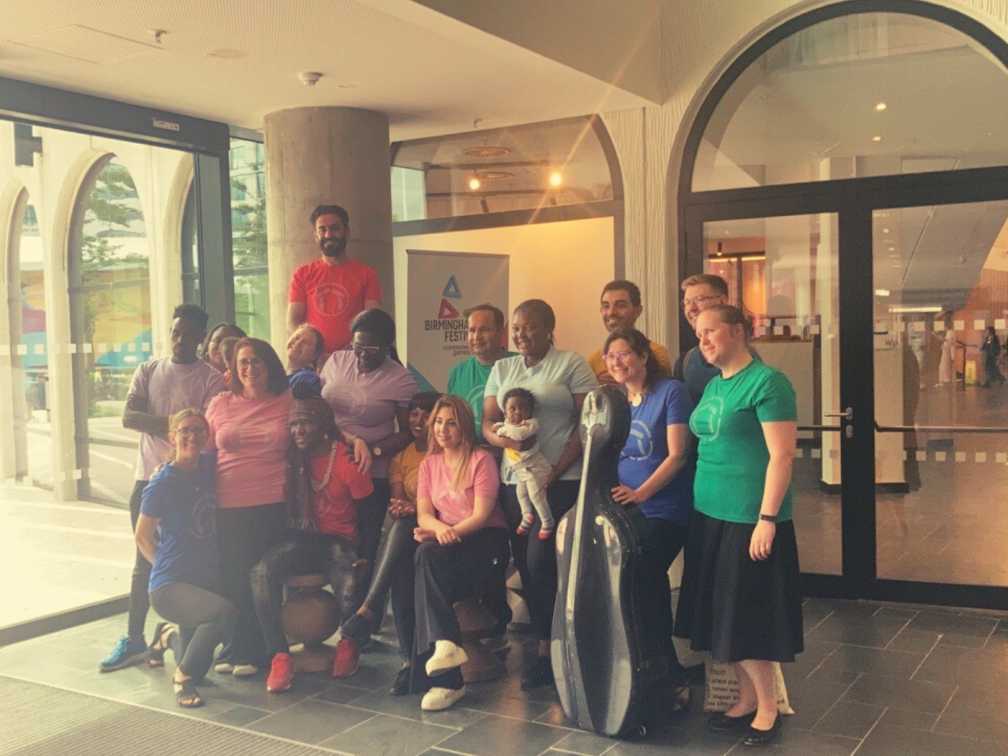 group of performers pose for a picture