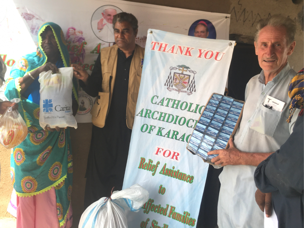 Missionary presents food rations