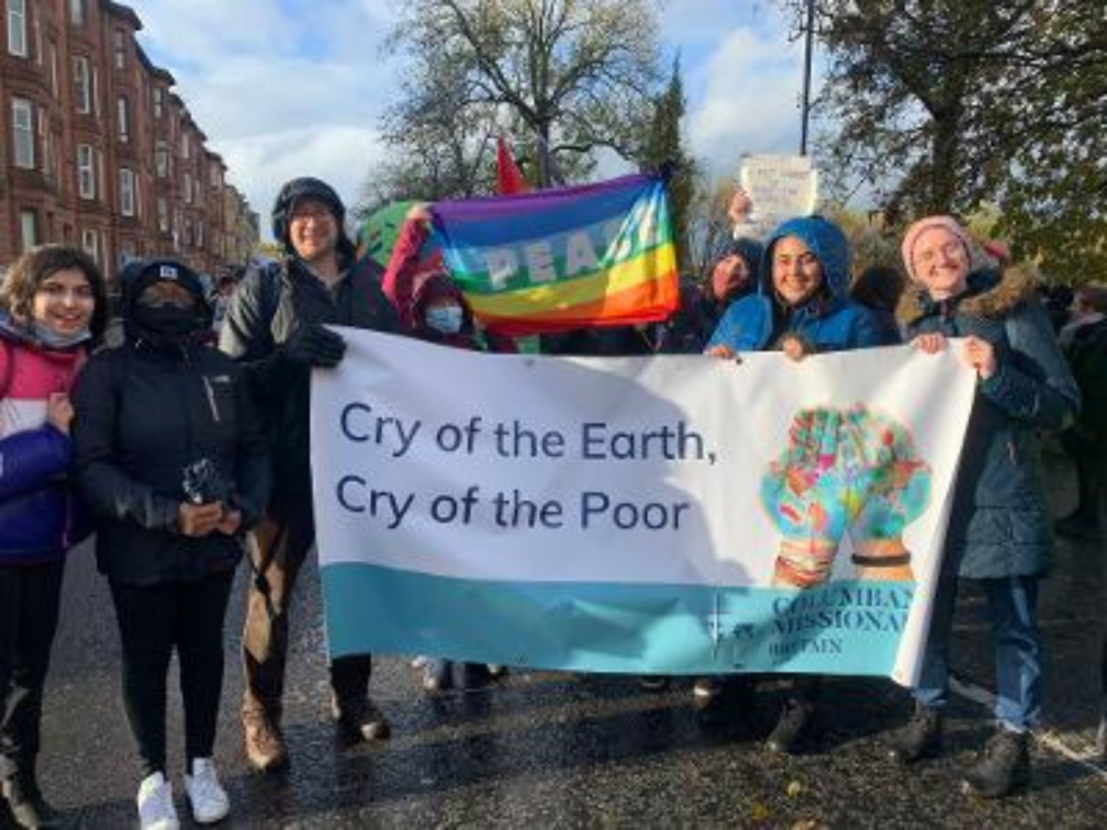 Columbans with banner
