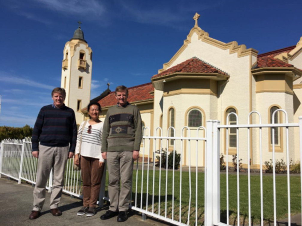 Teacher Ou with Frs. Kevin and Peter O'Neill