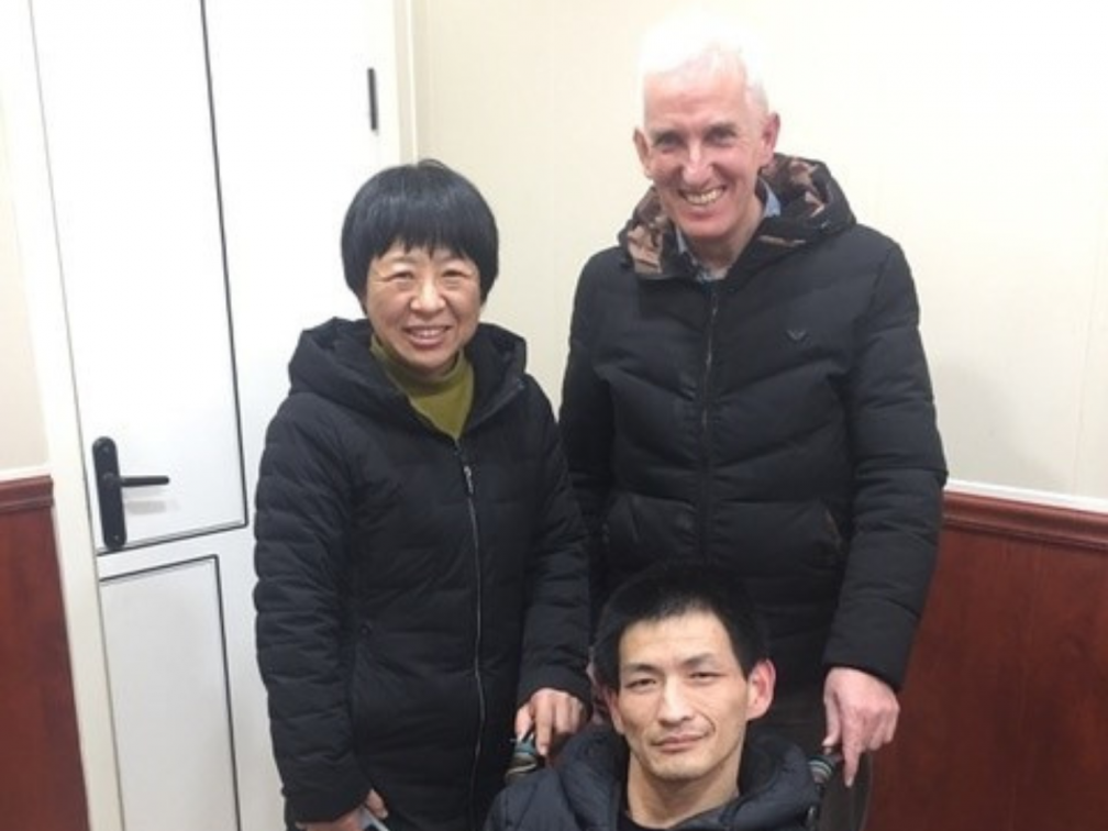 Fr. Dan Troy with Yang Xu and another guest