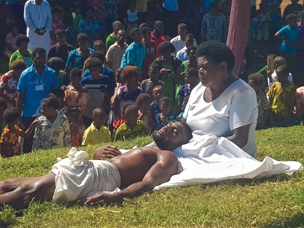 the actors get into character - 'Jesus' in the arms of his mother Mary