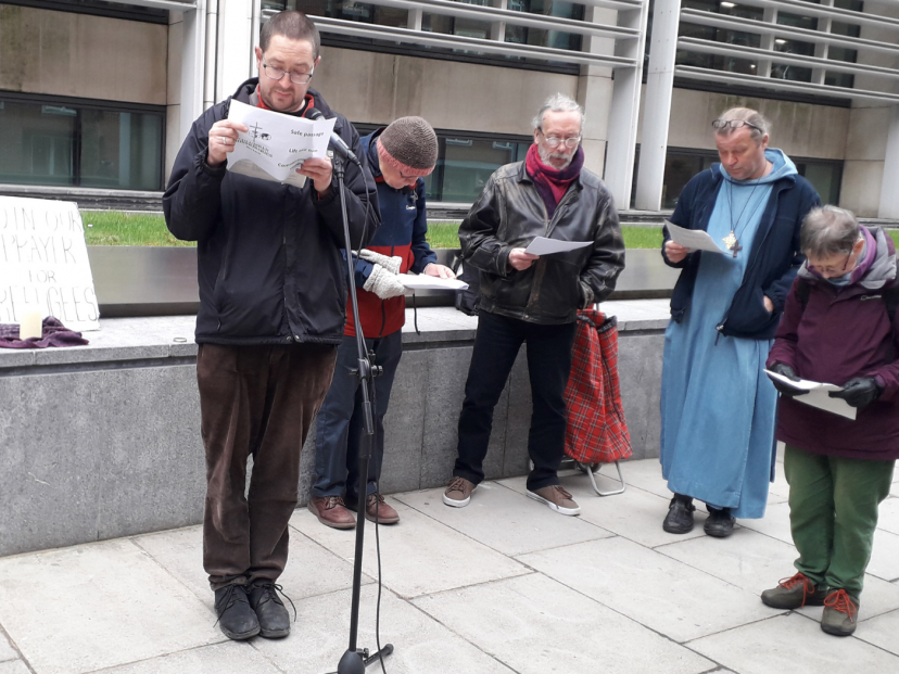 James Trewby and others at a monthly prayer vigil for refugees outside the Home Office in London