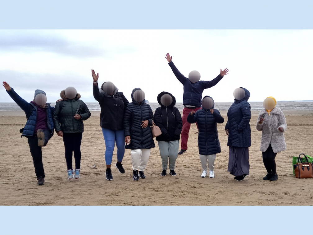 The group of refugees together. Faces blurred as per request