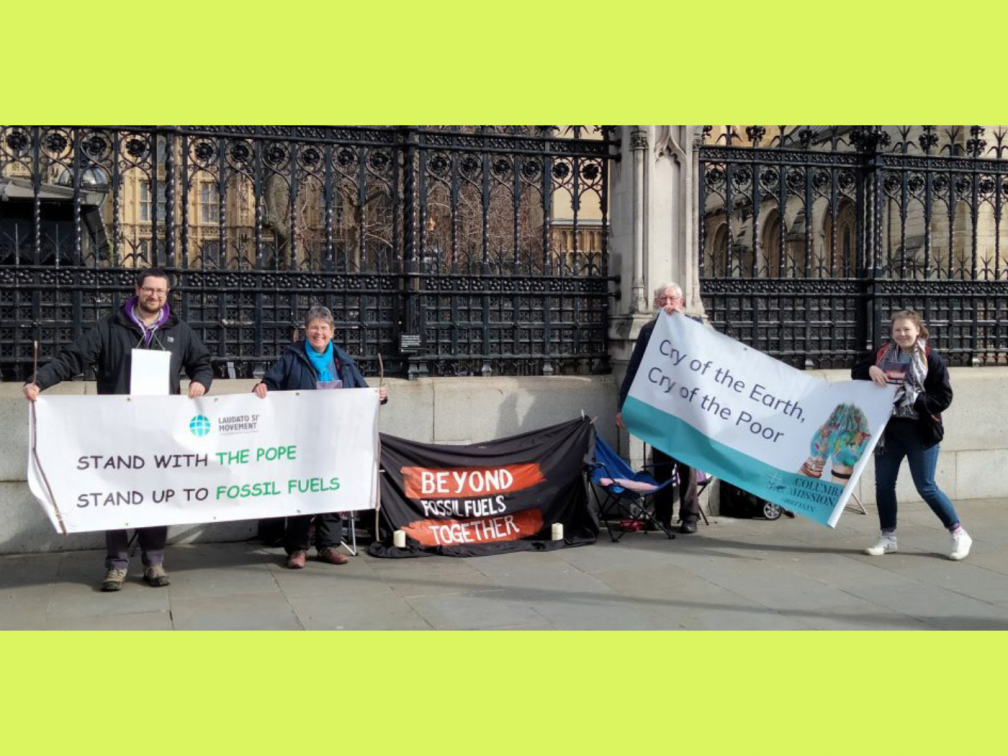 Columban 'stand up for fossil fuels' outside the Westminster Parliament. James Trewby and Sr. Kate Midgley on the left