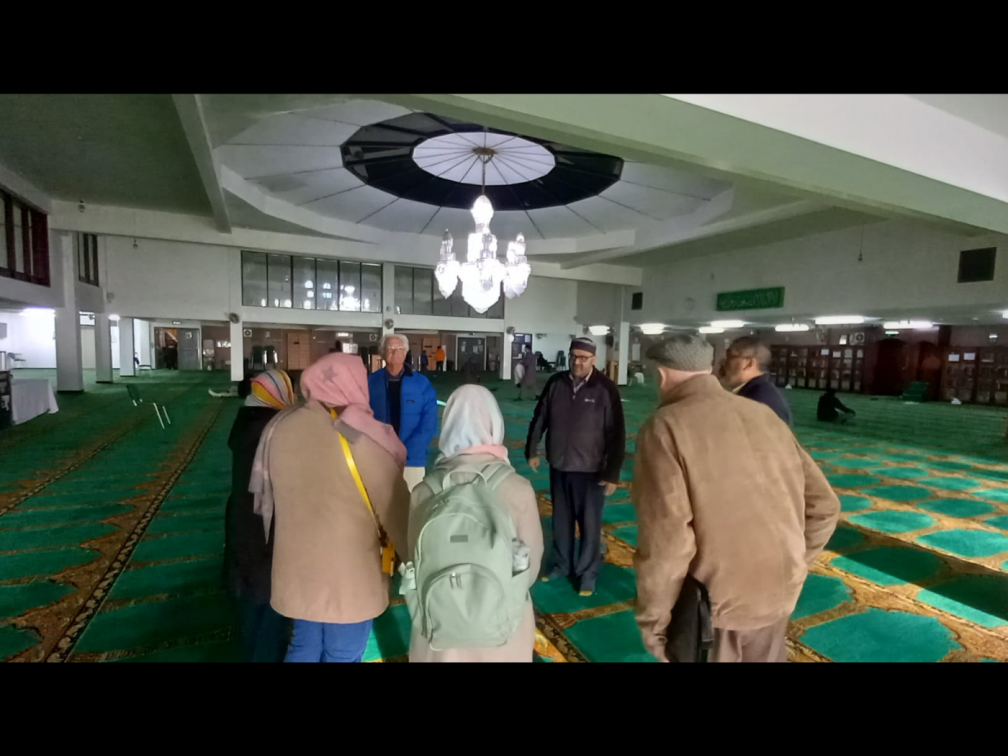 The group inside the Prayer Hall, led by Tahir Alam