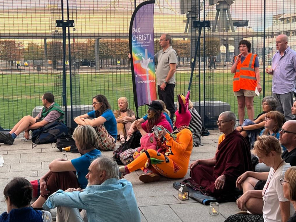 Columban JPE attends a prayer vigil outside a London arms fair in September 2023