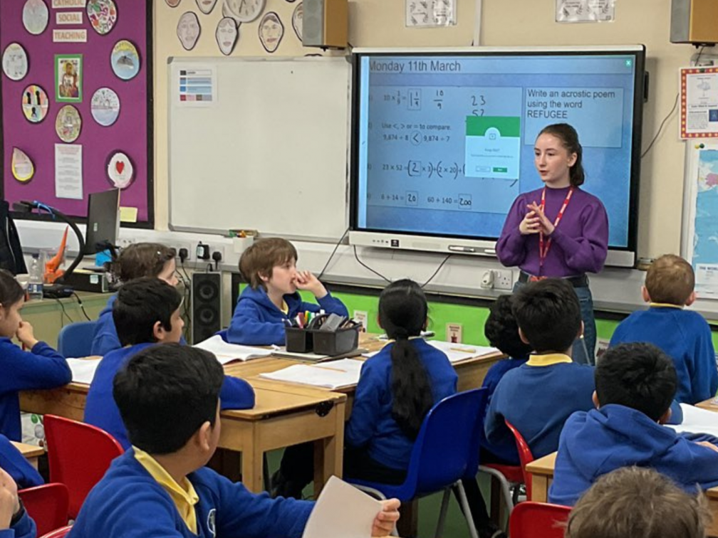 Hannah talks to students in a local primary school about the issues facing refugees and asylum seekers