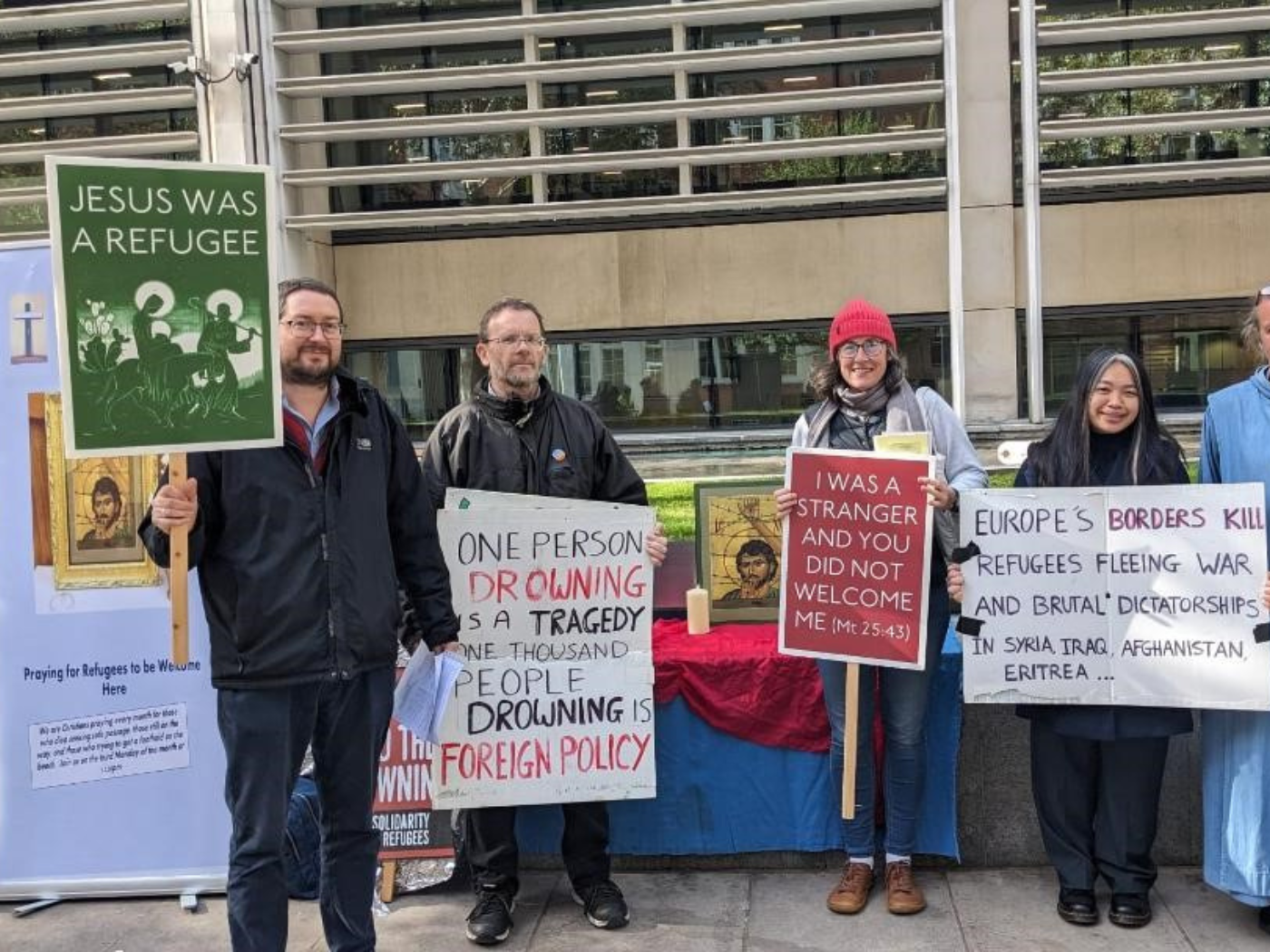 James and others at a prayer vigil for refugees at the Home Office in London