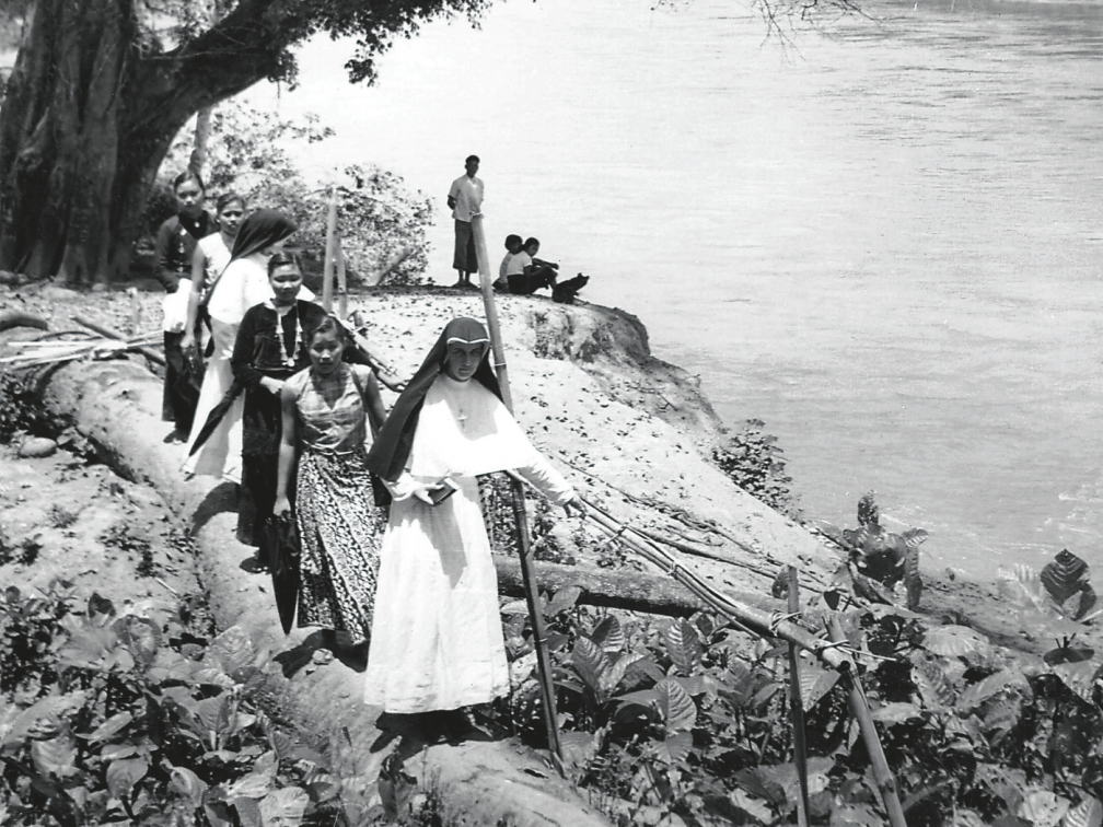 Sr. M Ita O’Mahony on the Irrawaddy River in Burma. Photo credit: Columban Sisters Archive.