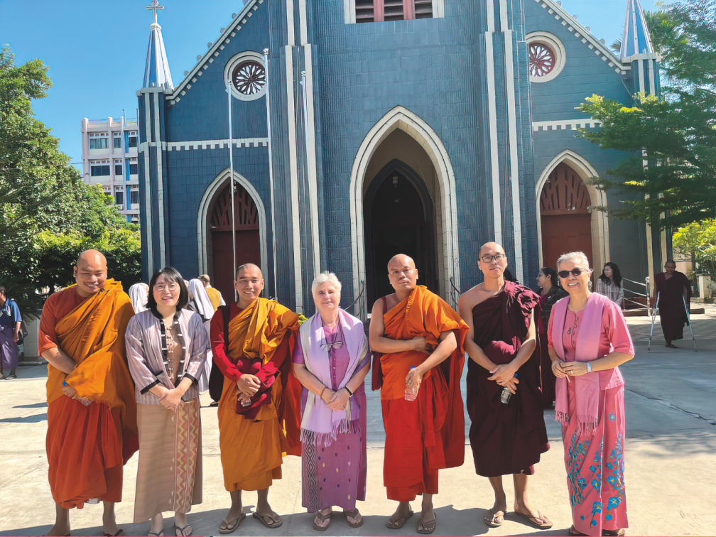 Sr. Theresa Kim encourages a young boy with special needs