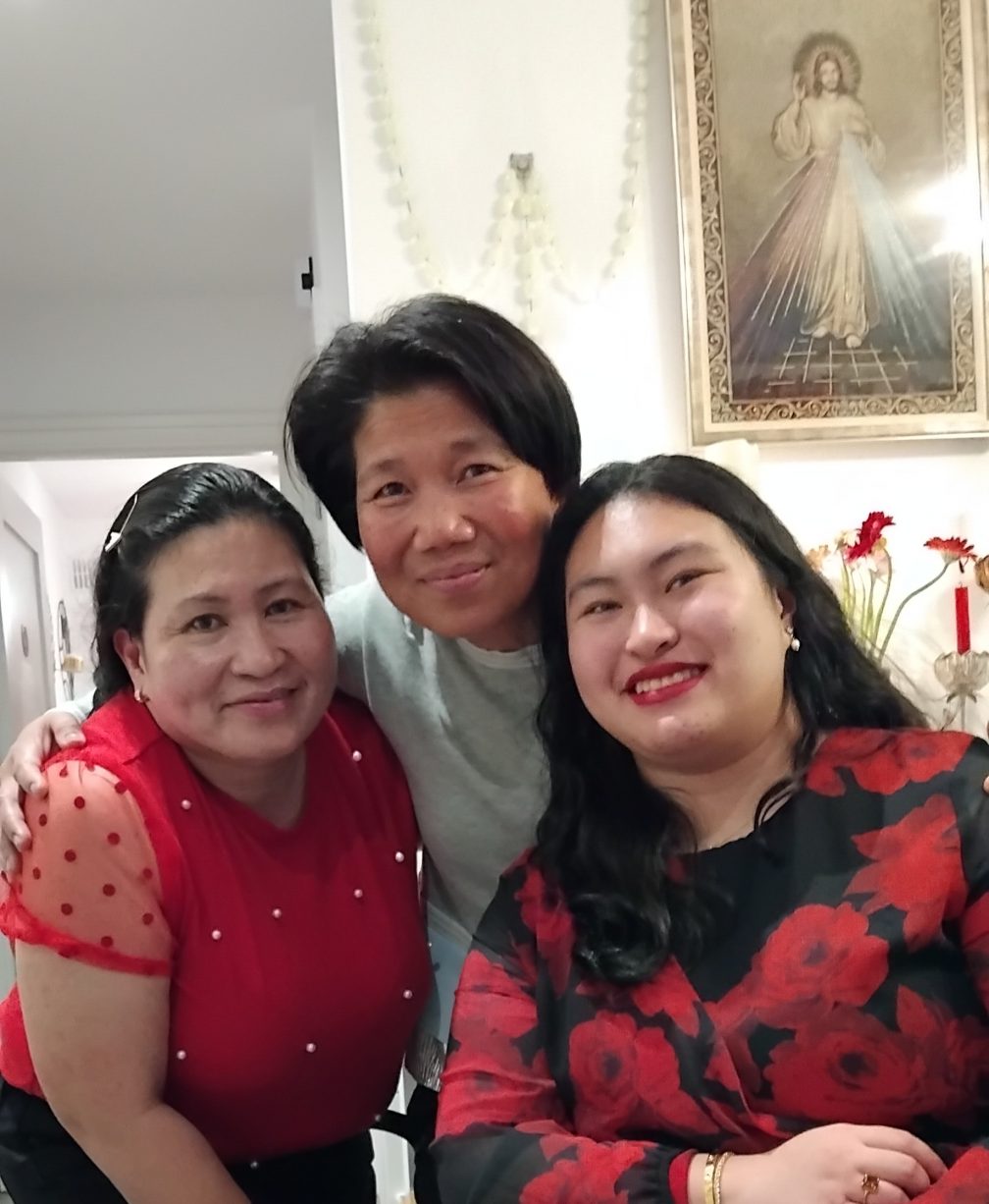 Angie (centre) with Arfe Conception, a Filipino nurse in Navan, Ireland and her daughter Angel