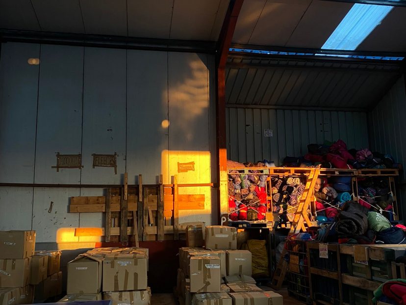 A warehouse in Calais containing aid for those seeking sanctuary in Britain. Photo credit: Abi Yendole.