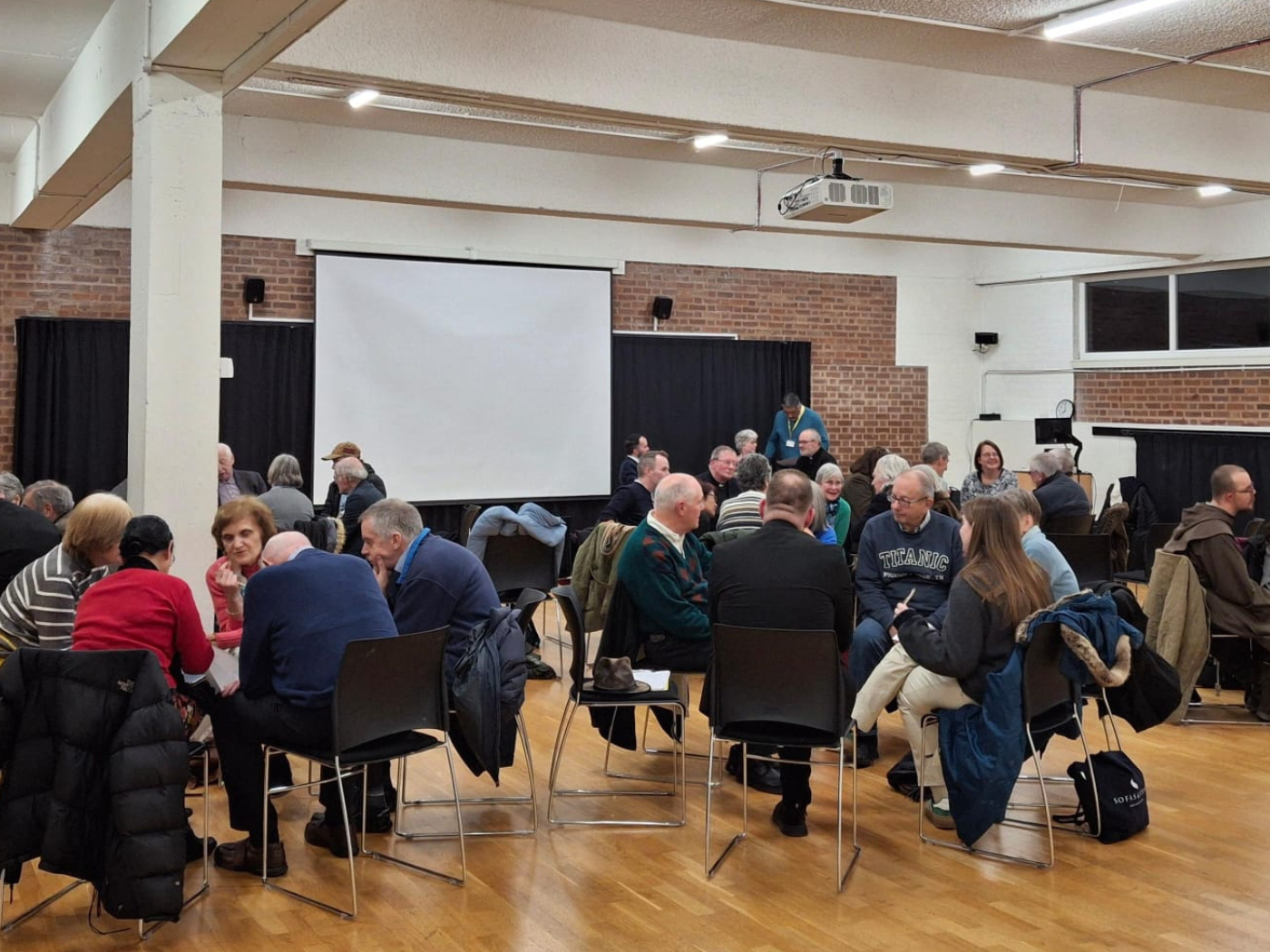 The participants break out into groups for discussion
