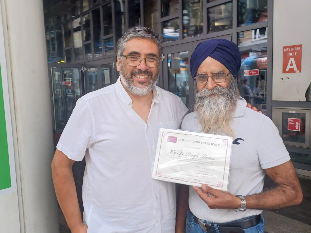 Mauricio and one of the new faith guides who successfully completed the course this year