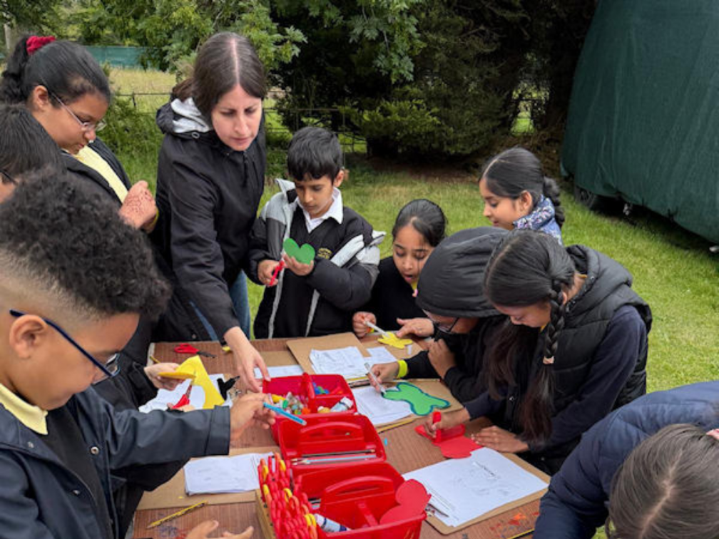 Jackie engages students from Holy Family Catholic Primary School in creative activities exploring creation