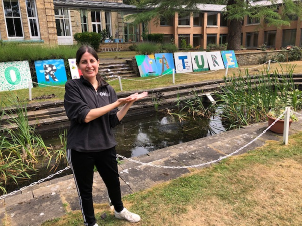Jackie poses by the pond in the grounds of the Solihull house