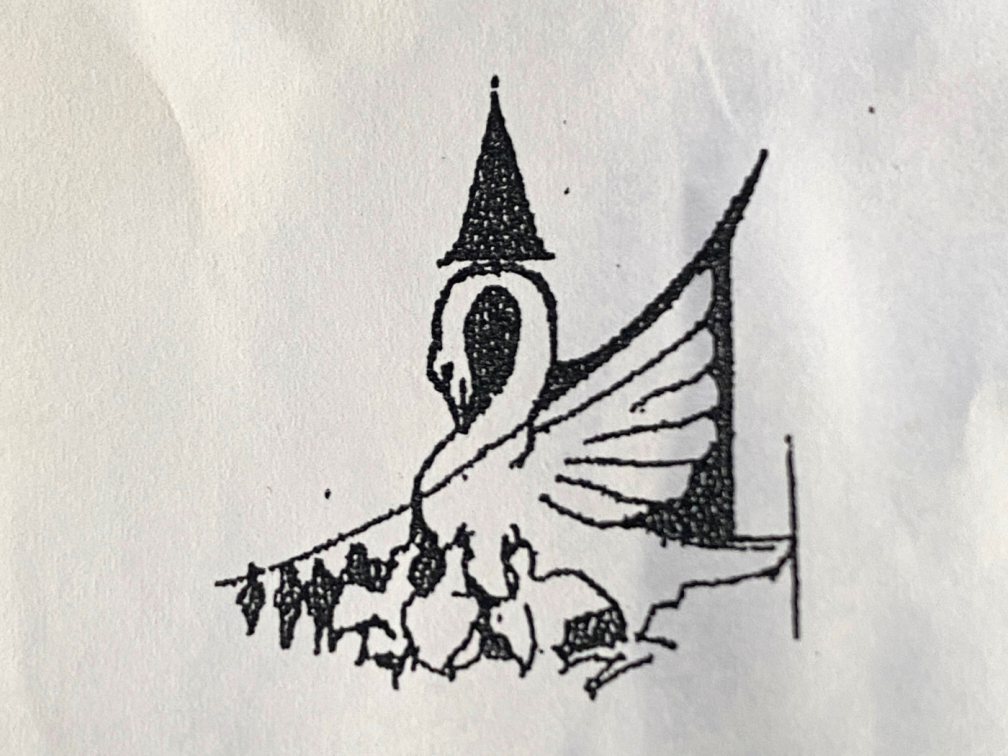 The logo of St. Mary's Bridgend; a pelican superimposed on the church