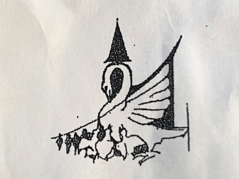The logo of St. Mary's Bridgend; a pelican superimposed on the church