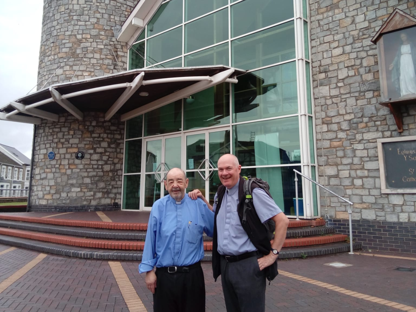 Columban Fr. John Boles (right) with Fr. Tim and the pelican church