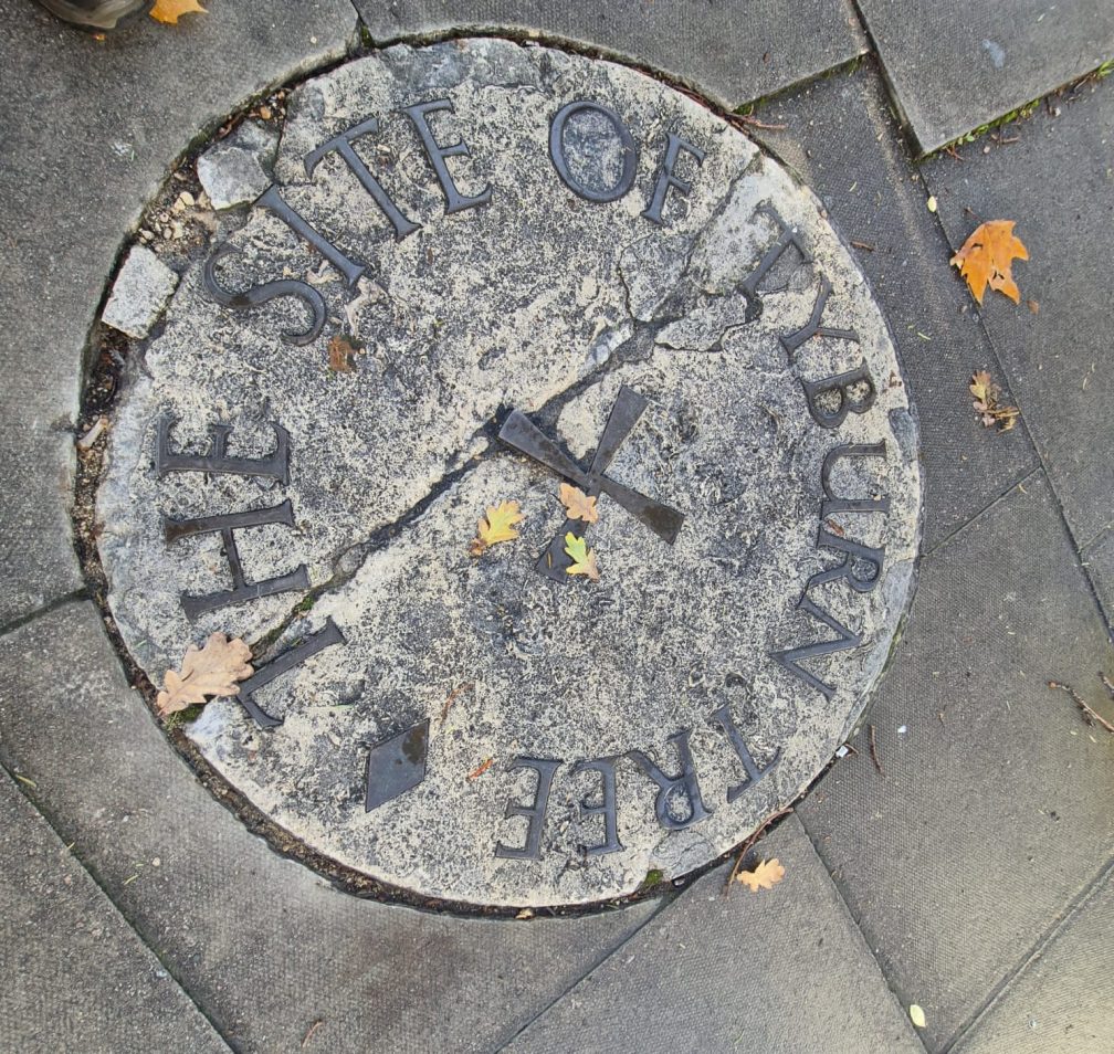 The pavement plaque just beyond Oxford Street in London marking the site of the 'Tyburn tree' gallows.