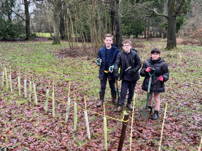 Students with trees planted in the grounds of Solihull