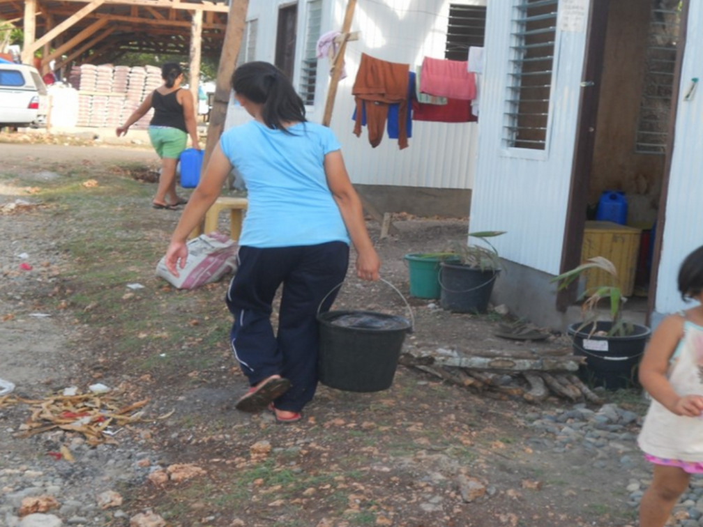 Families who cannot afford a water connection to their home must travel to the nearest river to wash clothes, clean kitchen utensils and carry water back for domestic chores