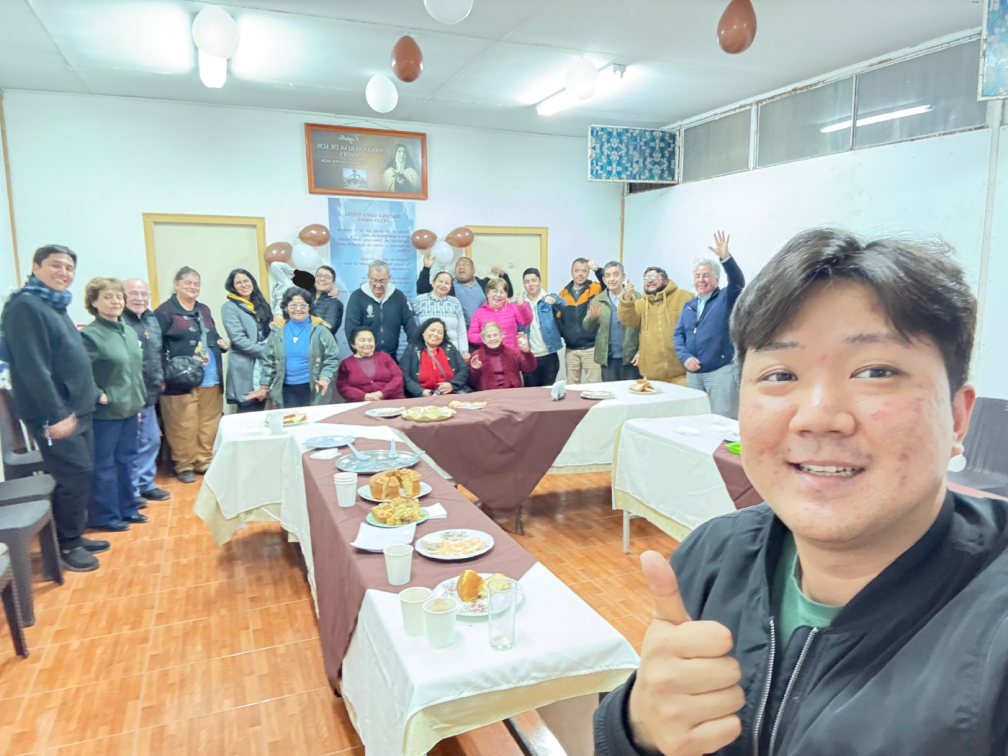 Ro Seungjun at a parish meeting with representatives from the three chapels in the parish