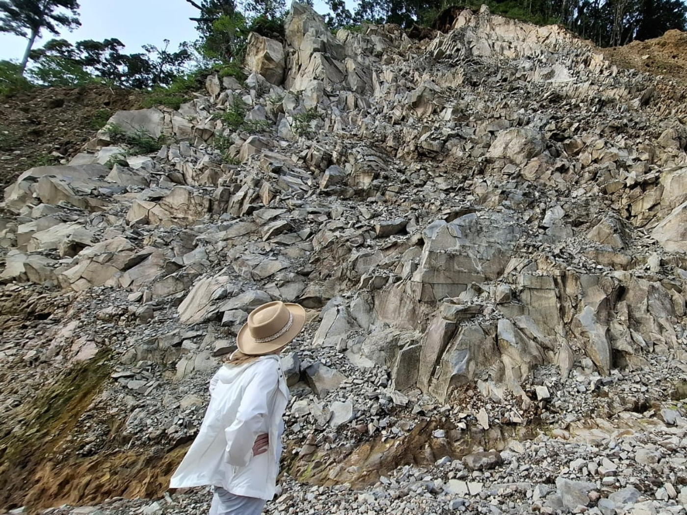 Amy examining the scale of destruction on the way to Lake Duminagat
