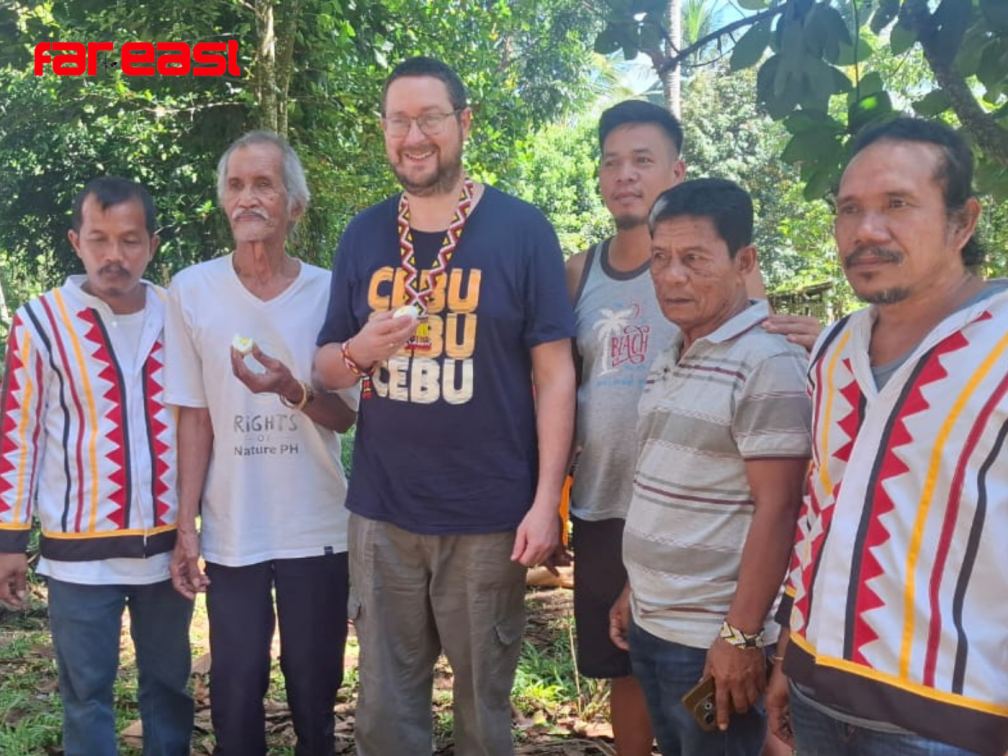 James Trewby with Datus (chiefs) Hapitan and Ontong, and some of the tree-growing volunteers