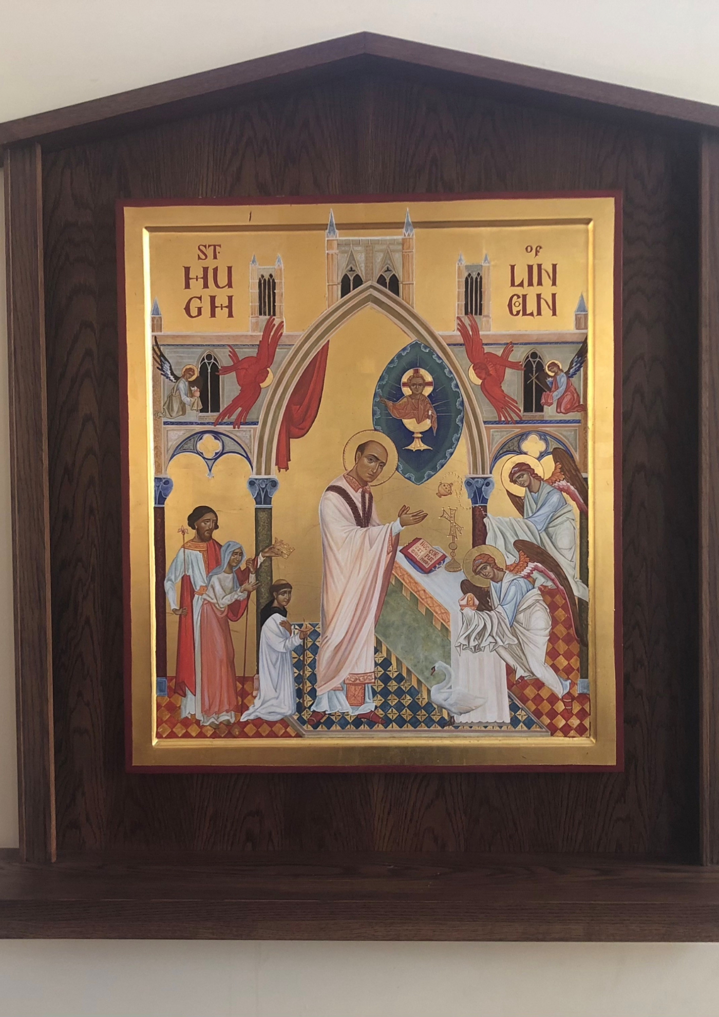 An icon of St. Hugh of Lincoln, celebrating Mass with his swan-friend in the foreground - displayed in the church dedicated to his memory in Knaphill, Woking, in the Diocese of Arundel and Brighton