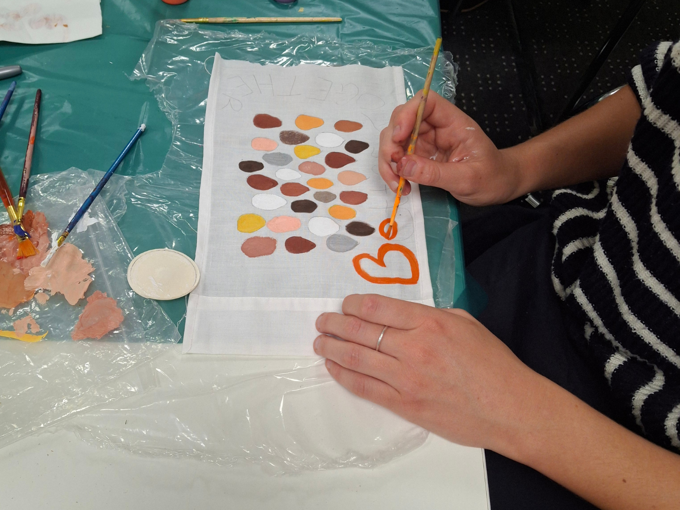 Banners and flags created in the arts session led by Nathalie earlier this week