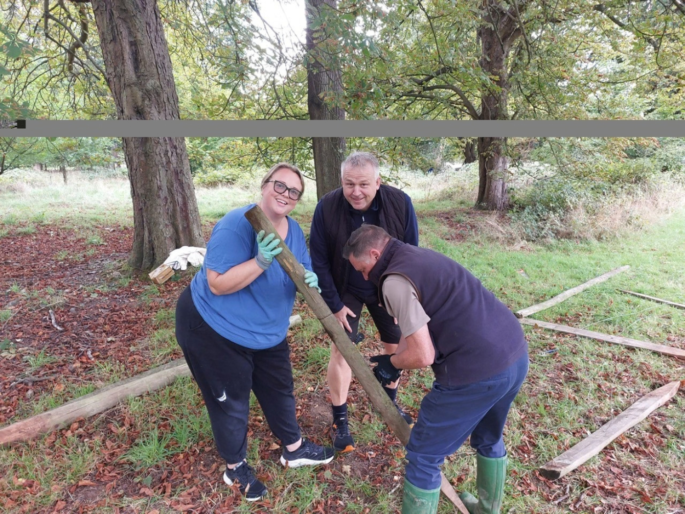 Volunteers help to clear old fencing and fence posts