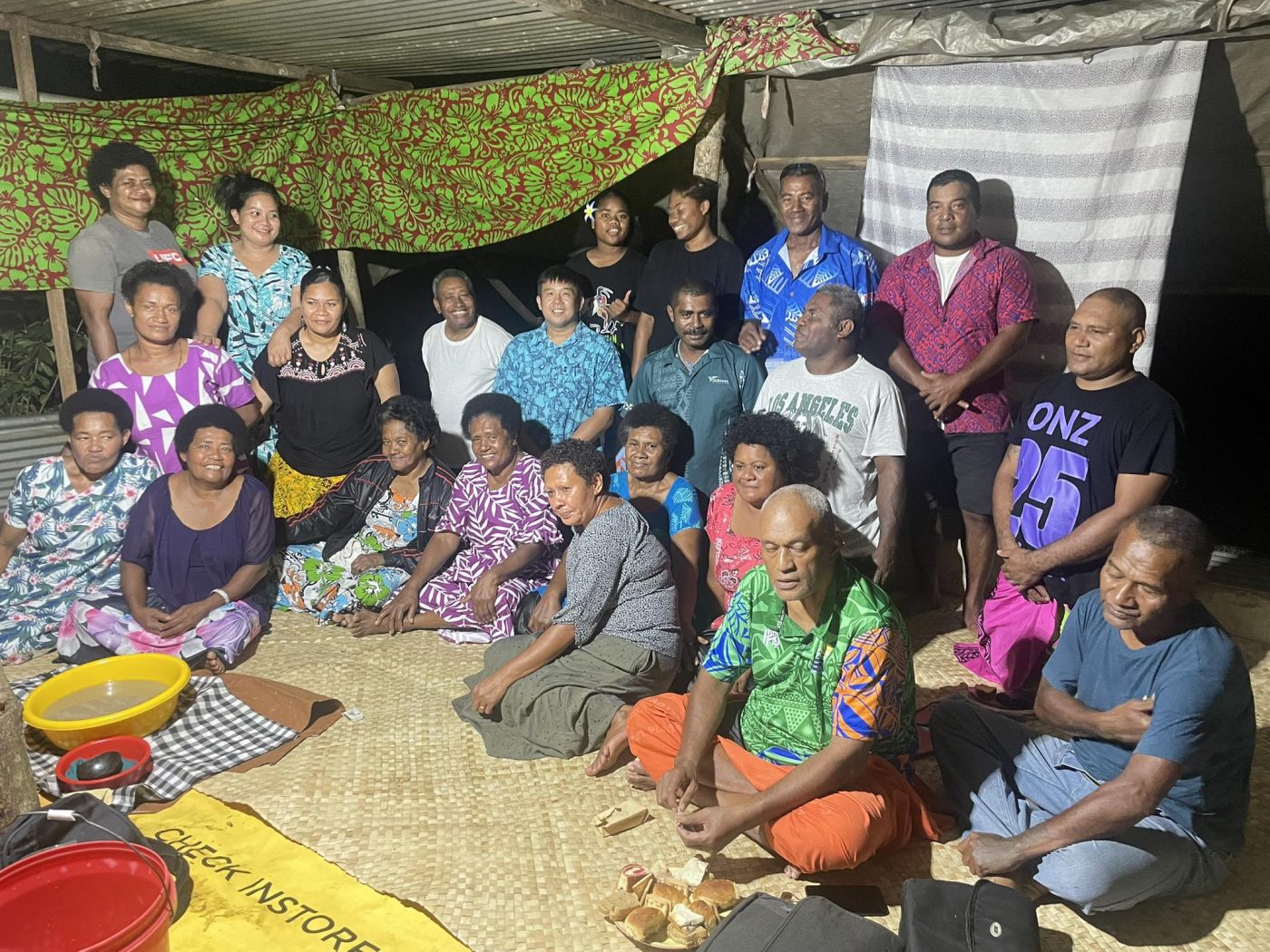 Fr. Jung (seated centre) with the lay leaders during the community visitation