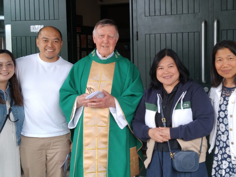 Lay missionary Angie Escarsa (right) with Columban Fr. Sean Coyle (centre), CLMCLT Coordinator Sherryl Lou Capili, and Sherryl’s brother and sister-in-law during a mission appeal at St. Charles Borromeo