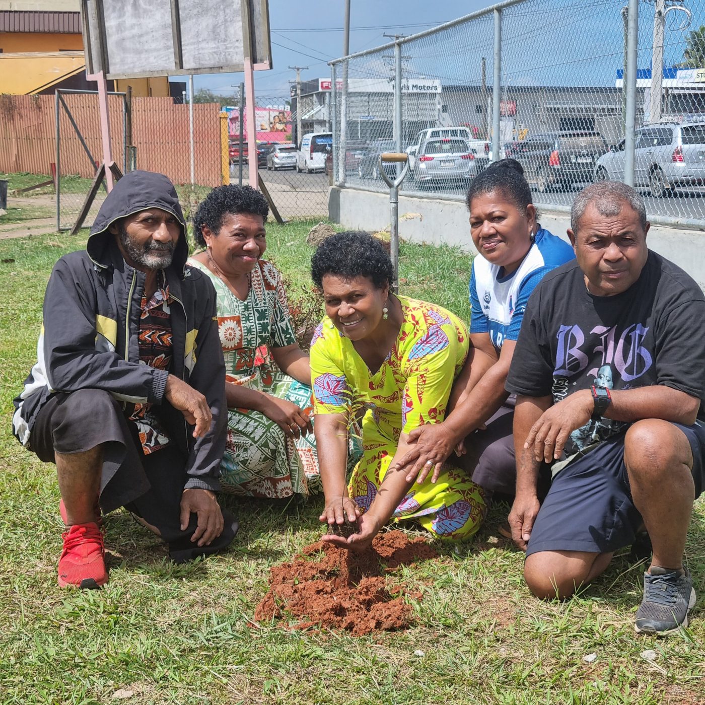 Parish Council members planting a tree during the Season of Creation